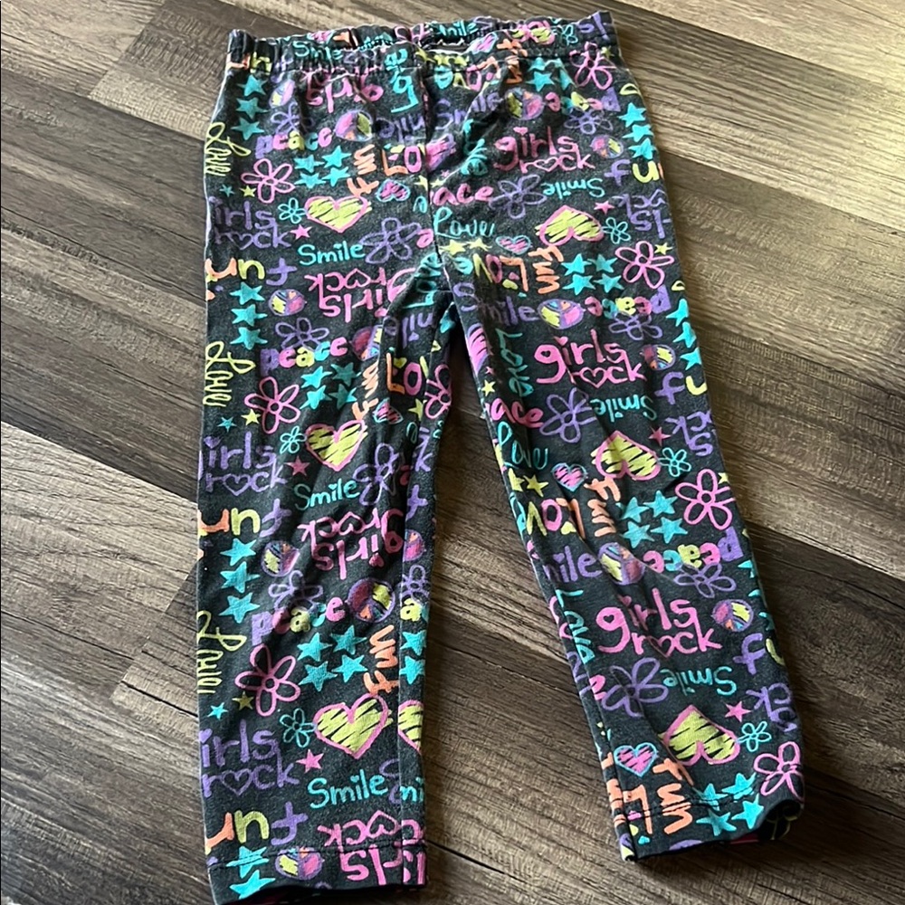 Black and Pink Leggings with Vibrant Design